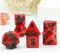 Inferno Blaze 7-Dice RPG Set - Red and Black Marble with Black Numbers