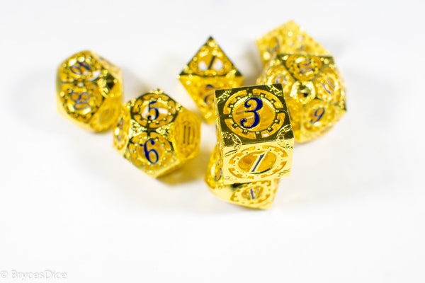 Gold Metal Hollow Gear Dice with Blue Numbers 7-Dice Set