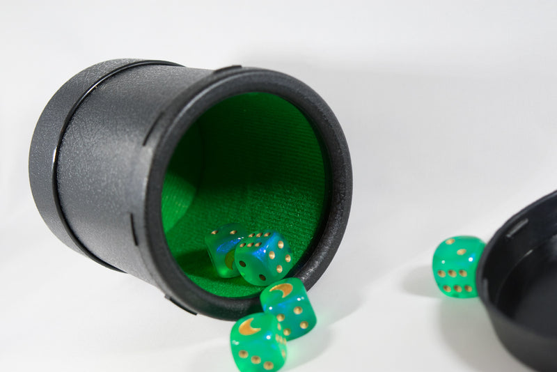 Black dice cup with lid and green interior felt. Great for yahtzee and other games. Also great for transporting dice on the move. Great dice cup.