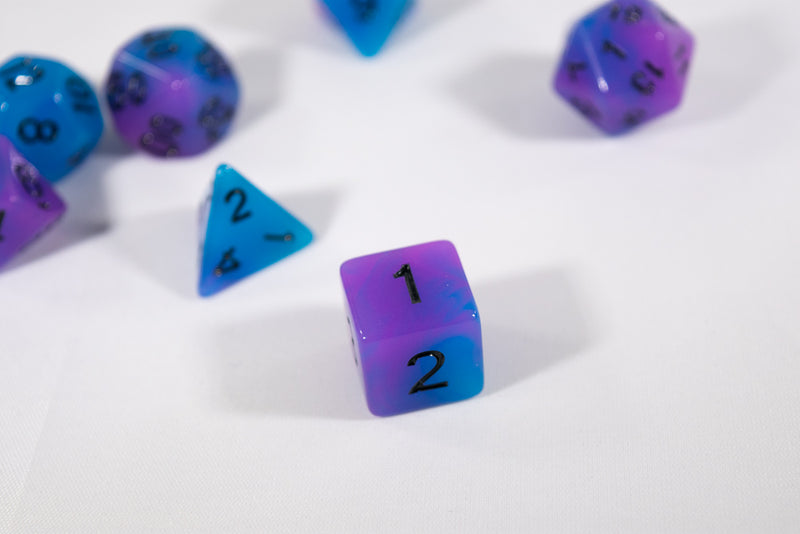 Blue and Purple Glow-in-the-Dark 7-Die Set w/Black Numbers by HDdice
