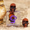 Orange Skull Dice | Clear RPG 7-Dice Set w/ Purple Numbers