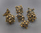 Gold Deadly Skull Dice Hollow Metal 7-Dice Set